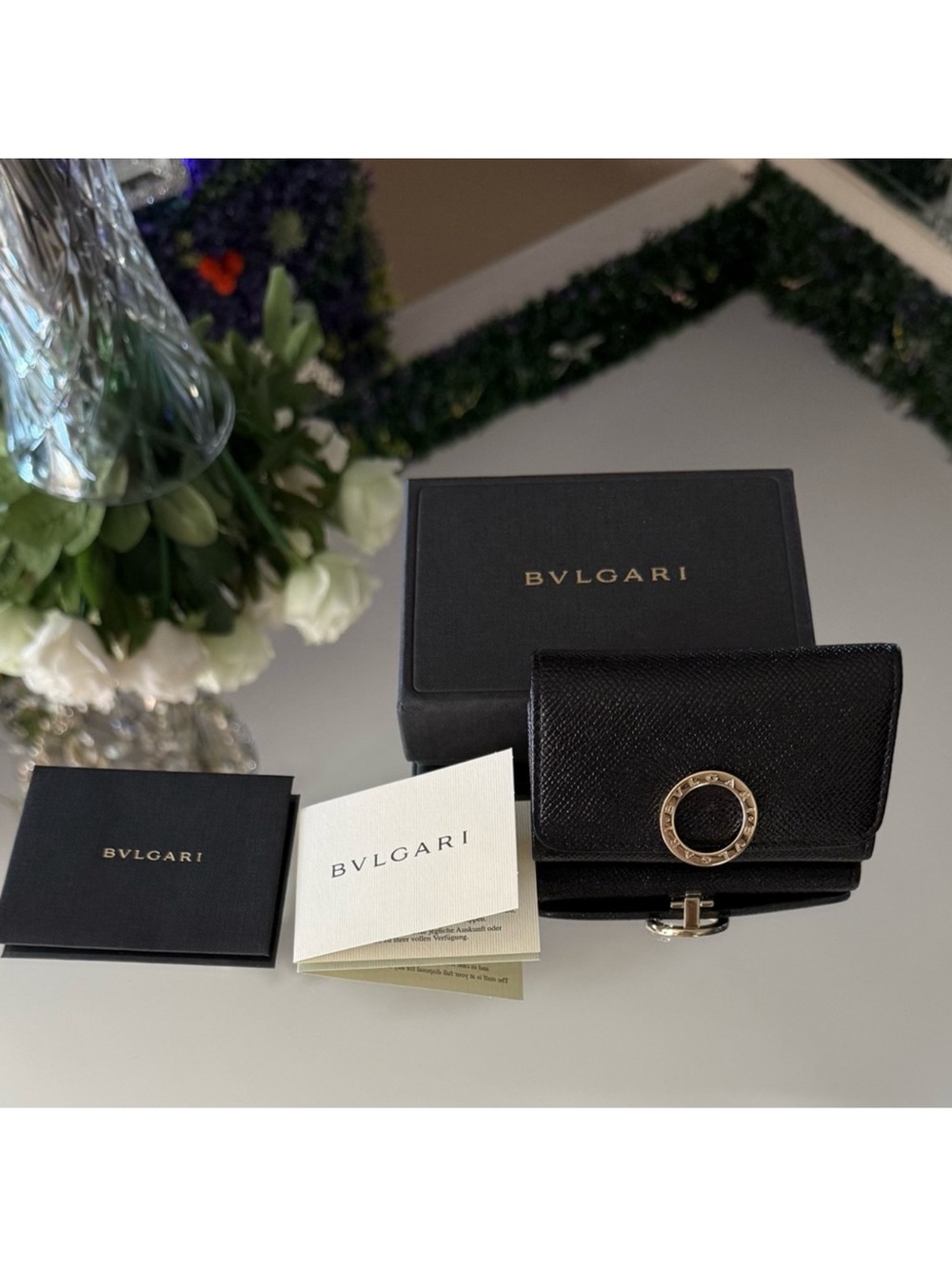 Bulgari Black Leather Compact Wallet with Gold Circle Emblem